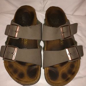 BIRKENSTOCK. lightly worn. tan/green color.